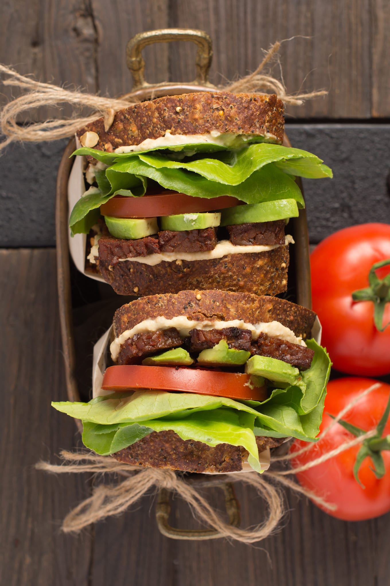 breakfast sandwich next to fresh tomatoes