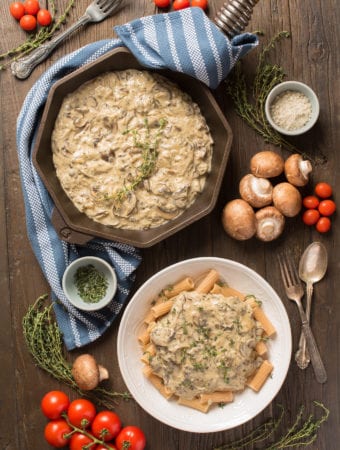 truffled mushroom sauce on pasta in bowl and in pan