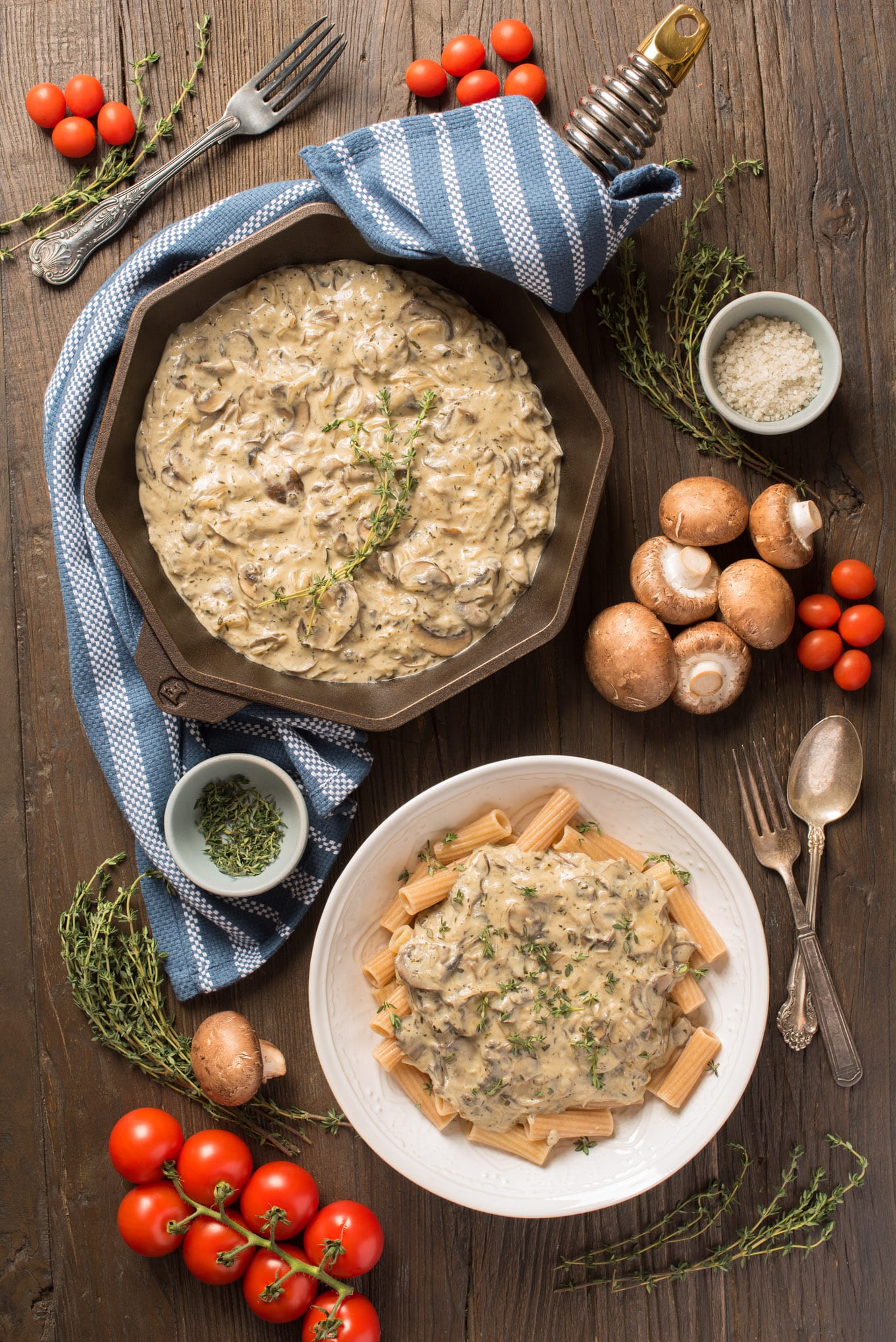 vegan mushroom cream sauce on pasta in bowl and in pan