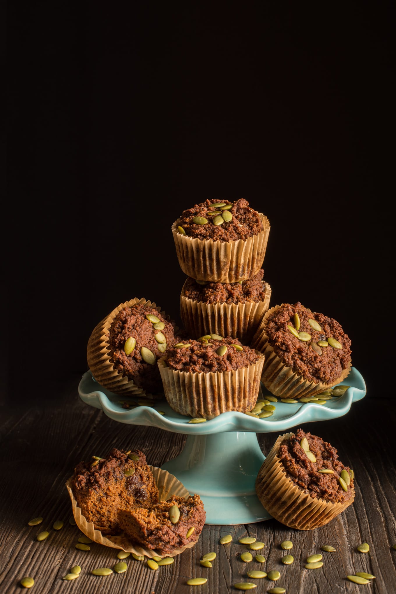 pumpkin spice muffins on turquoise cake stand