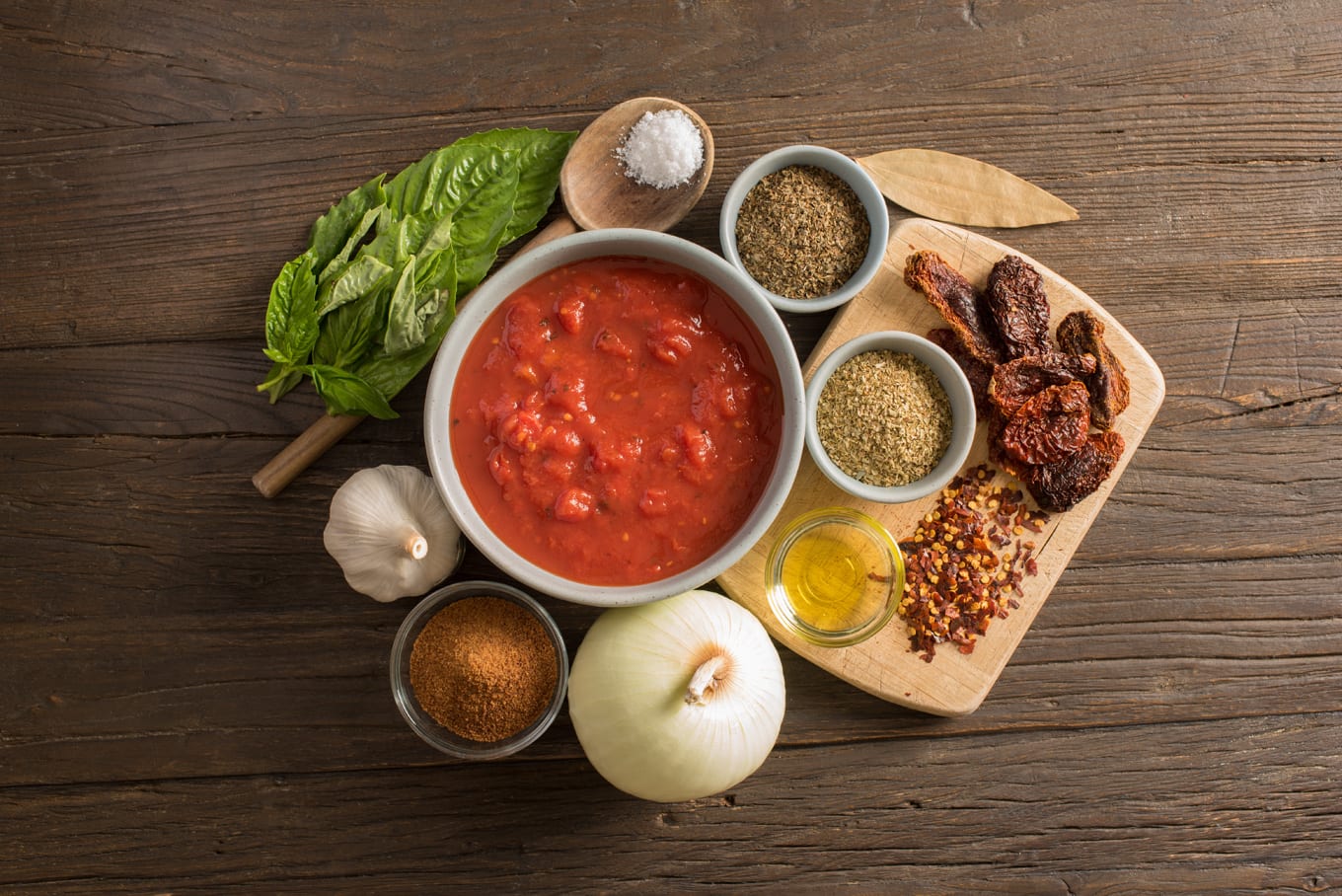 simple marinara sauce ingredients in bowls