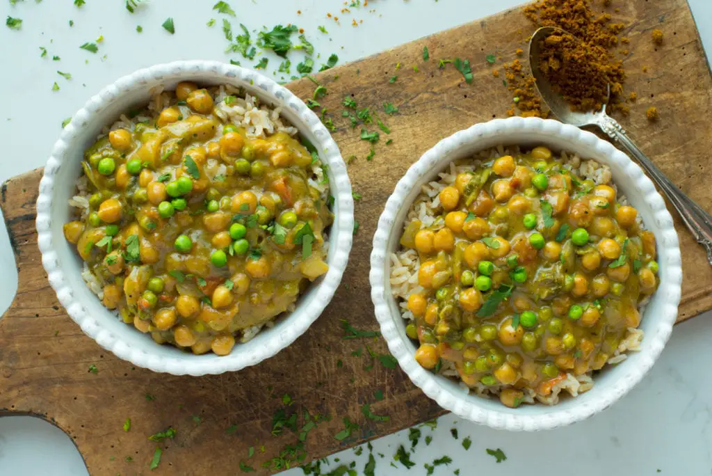 coconut chickpea curry masala in two bowls on rice