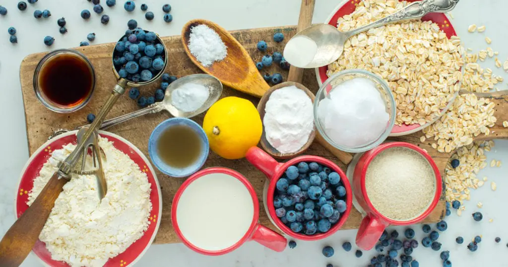 recipe ingredients in cups and spoons and on plates