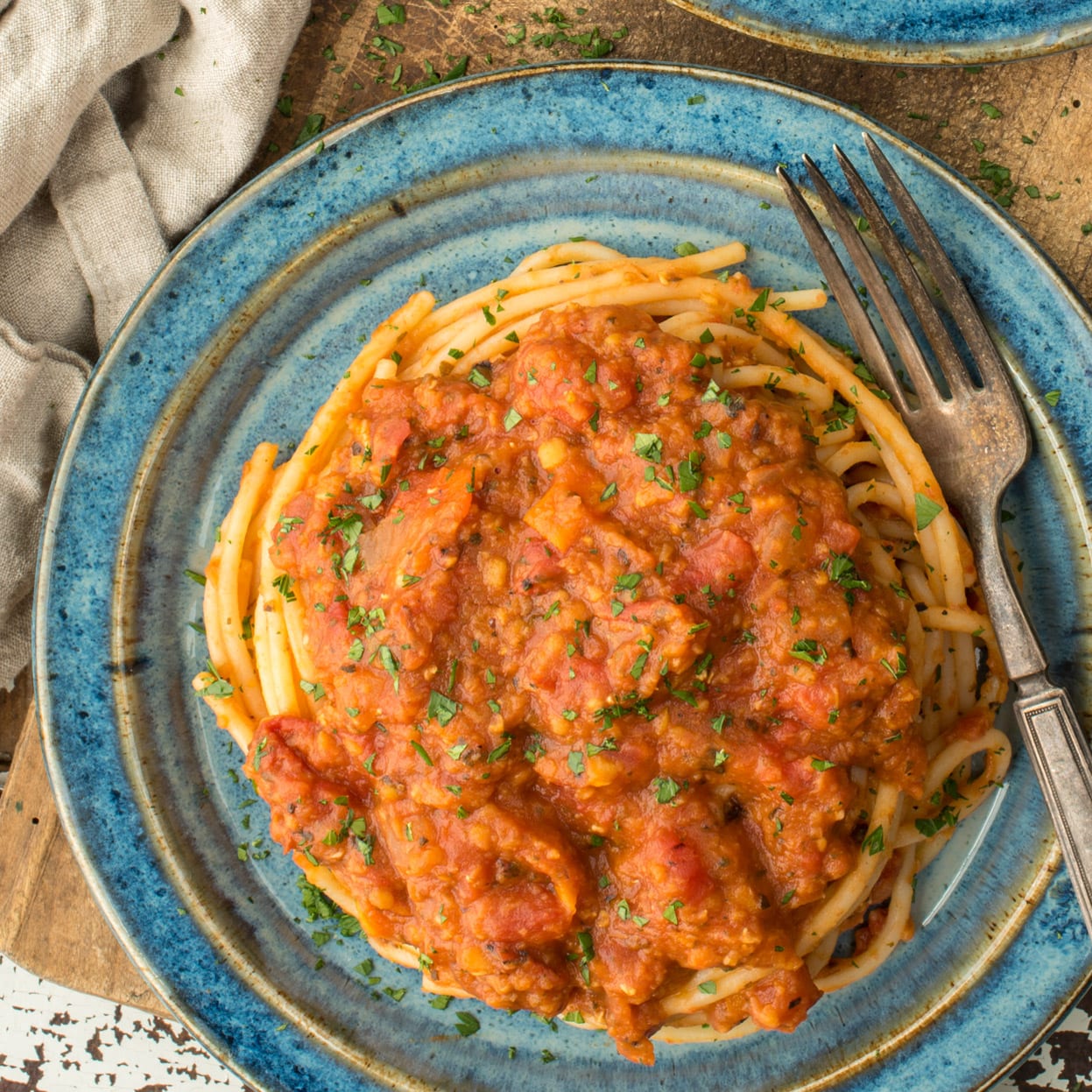 lentil bolognese on spaghetti on plate