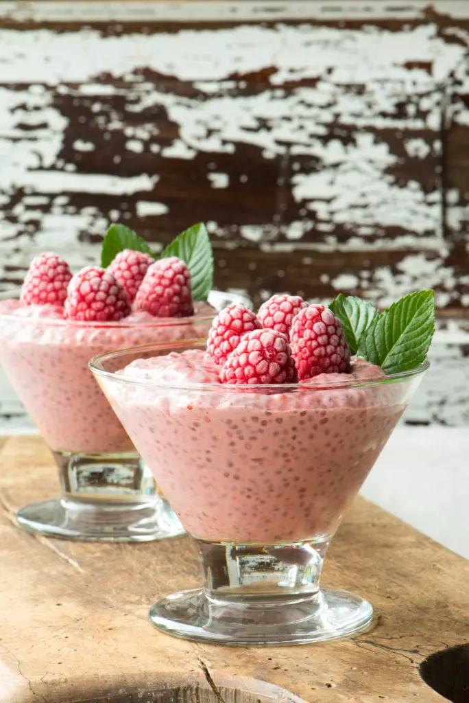 raspberry chia pudding in two glasses