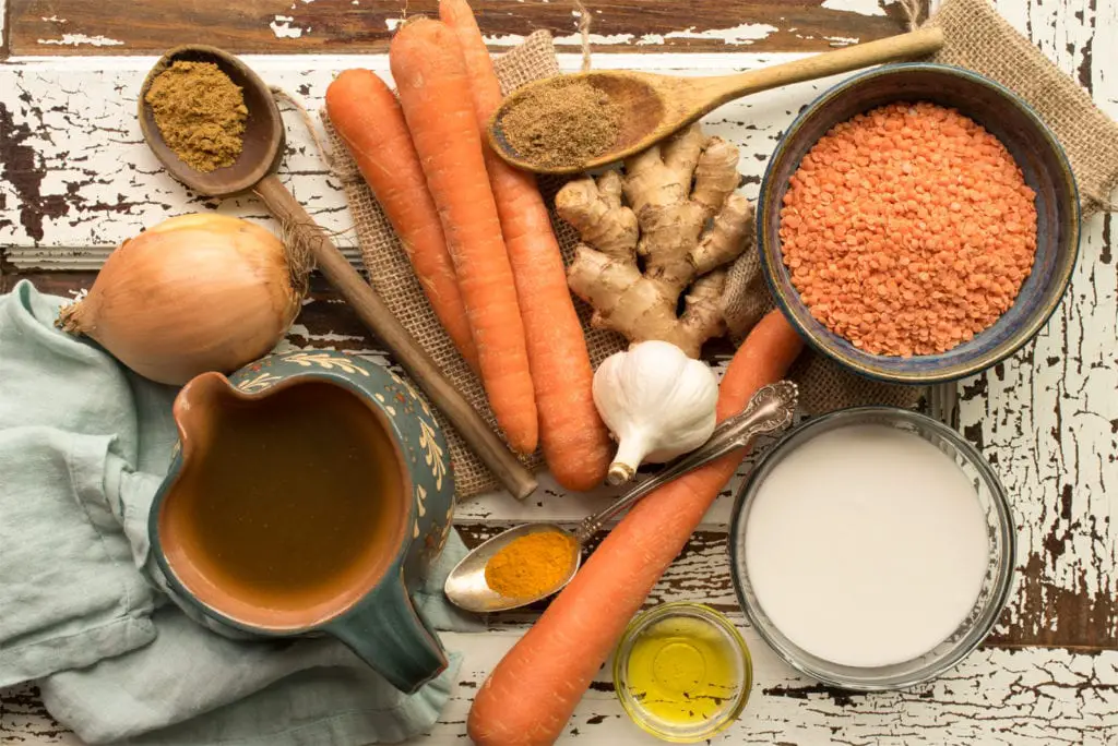 soup ingredients in bowls and on board