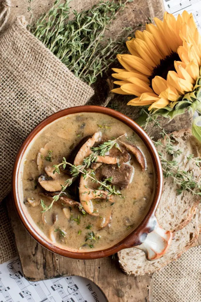 homemade mushroom soup next to sunflower