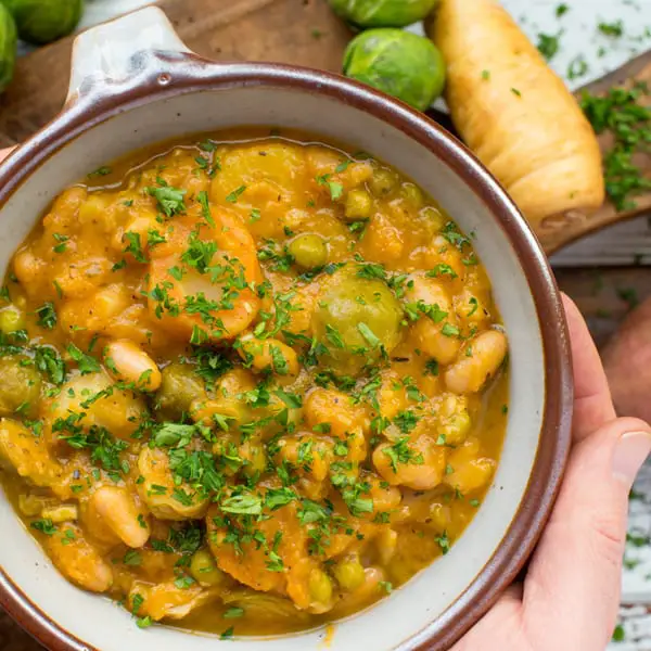 autumn vegetable and white bean stew in bowl