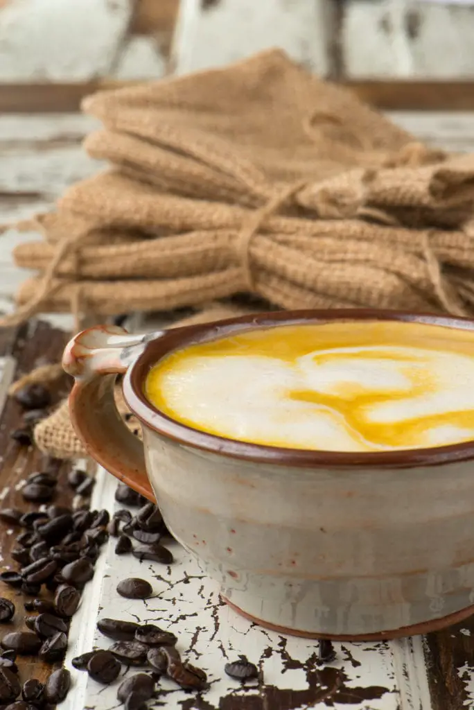 superfood coffee in cup next to burlap