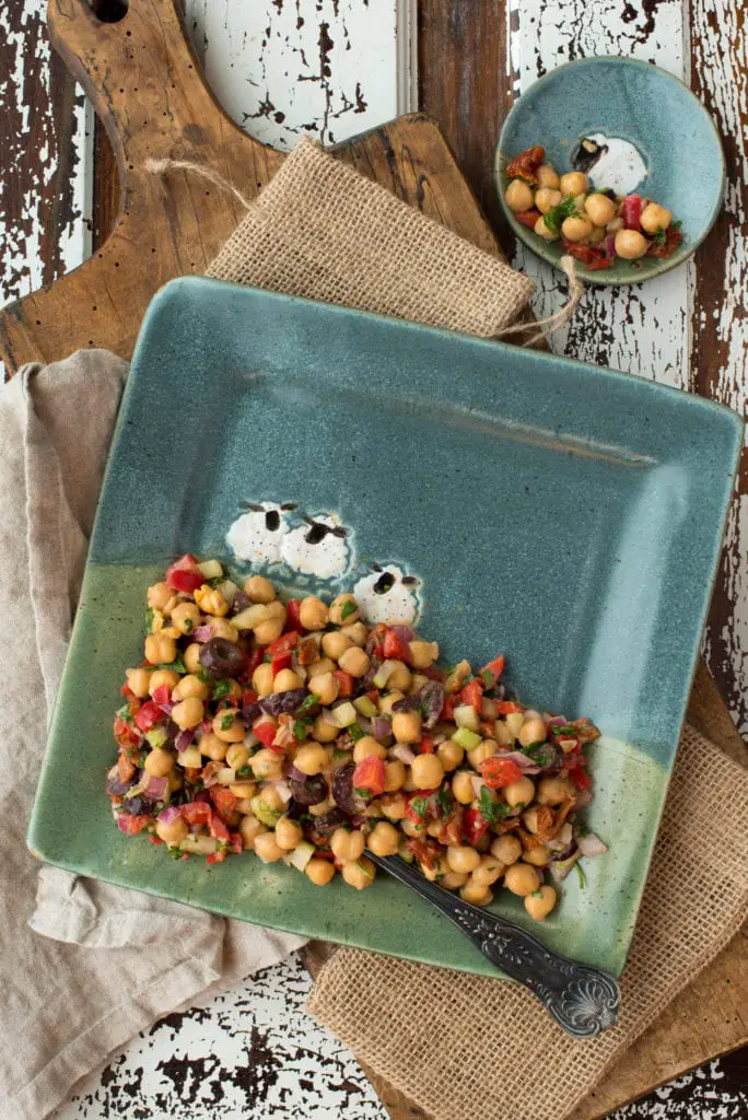 greek chickpea salad on plates