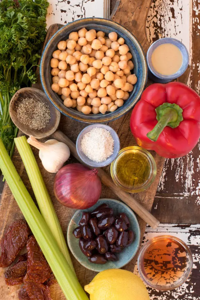 greek chickpea salad ingredients on board