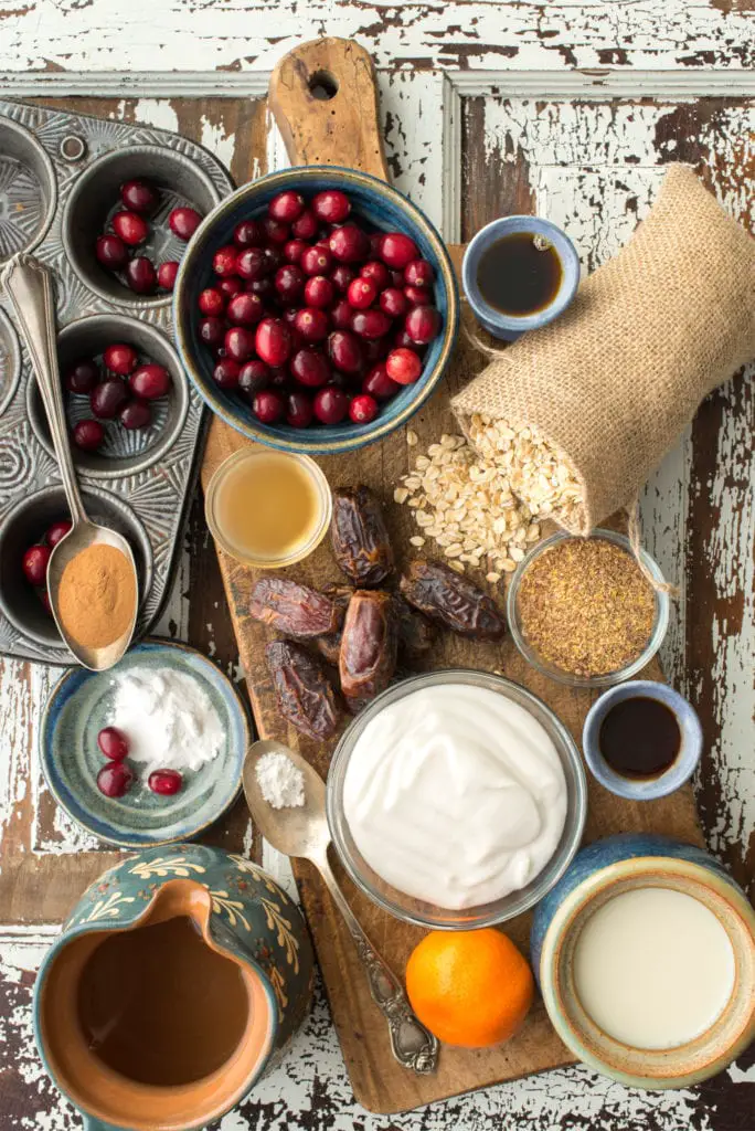 oatmeal cranberry muffin ingredients on cutting board and in bowls