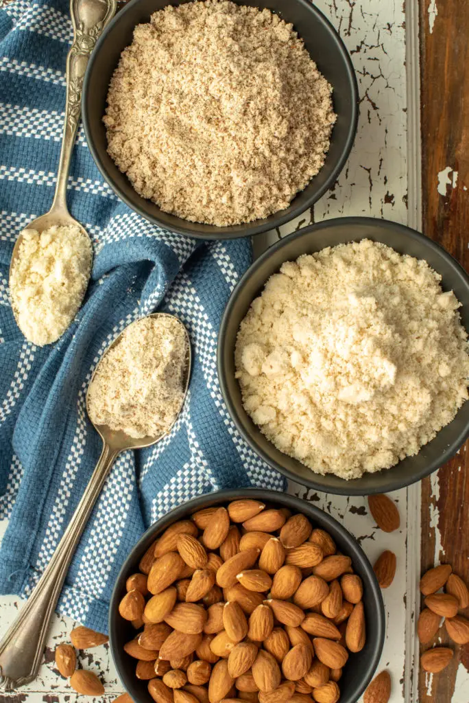 almonds, almond meal and almond flour in bowls