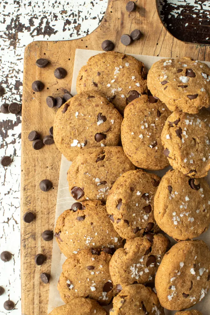 almond chocolate chip cookies on cutting board