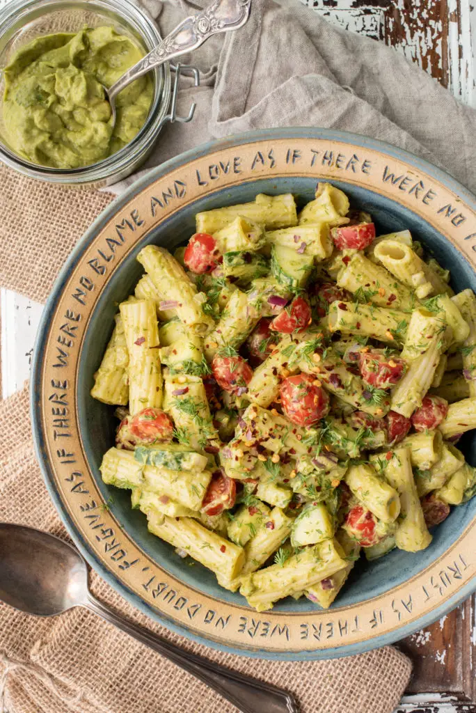 avocado dill pasta salad in serving bowl