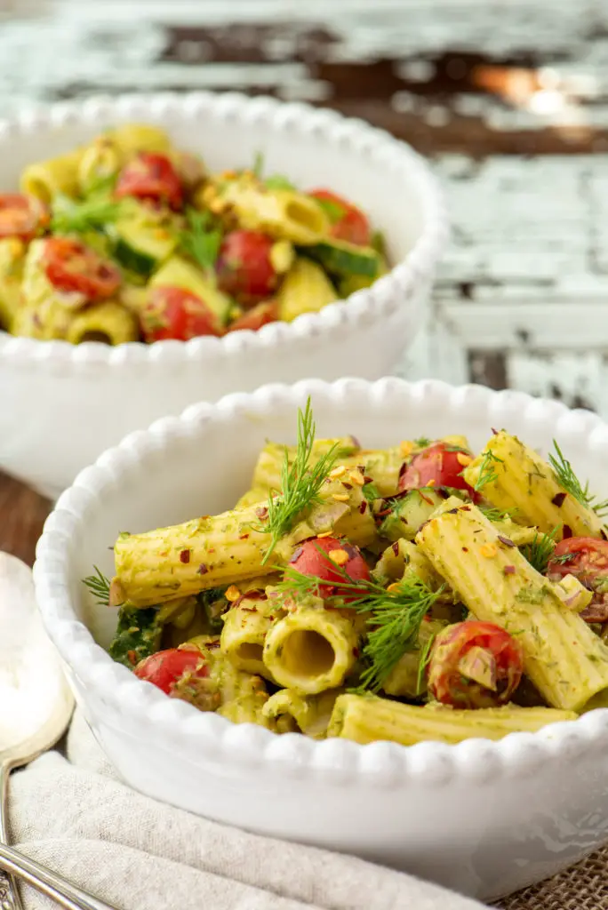 avocado dill pasta salad in bowls