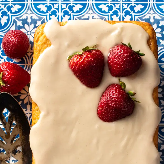 lemon strawberry loaf garnished with strawberries