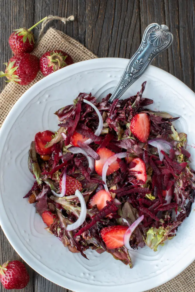 strawberry beet maple almond salad in bowl