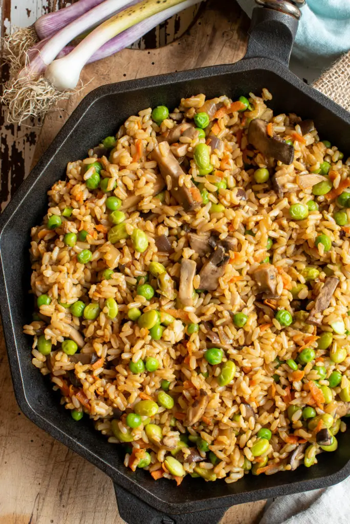 bountiful vegetable fried rice in frying pan