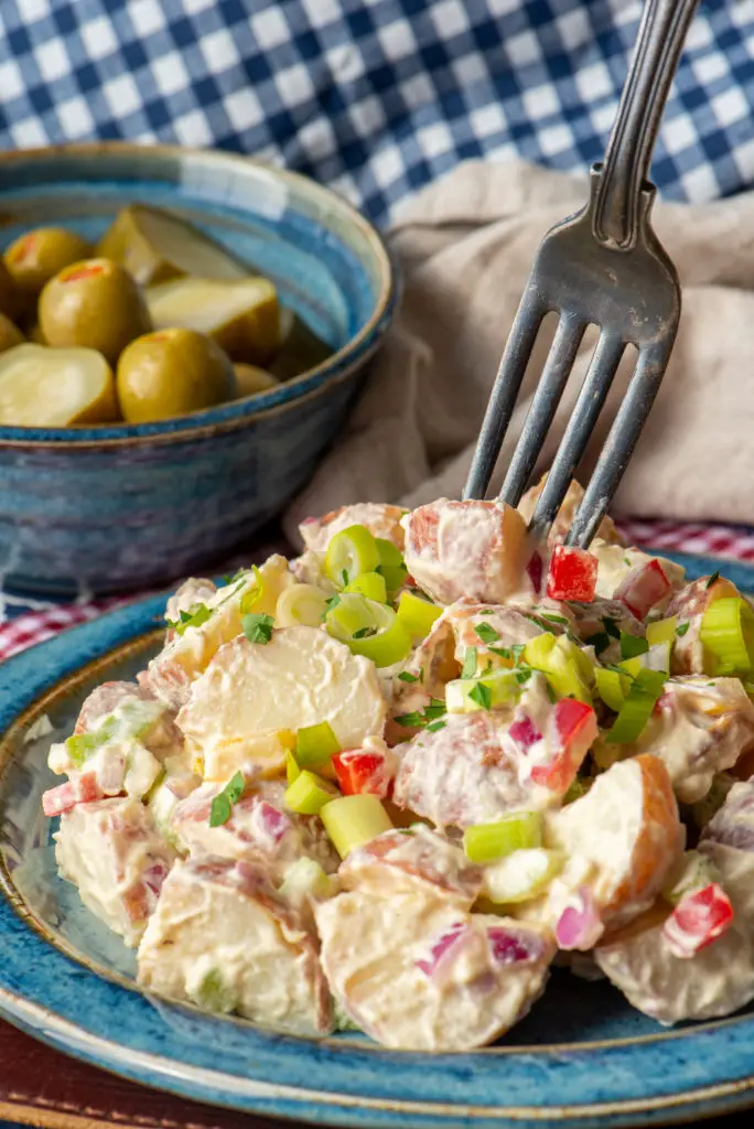 creamy vegan potato salad on plate