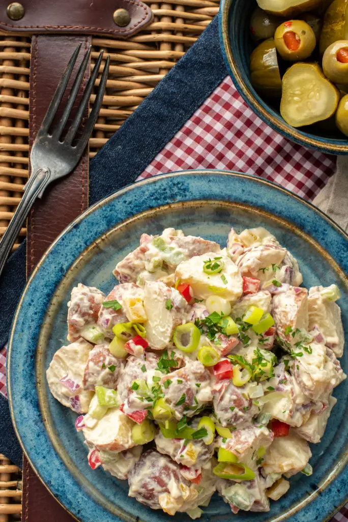 creamy vegan potato salad on plate