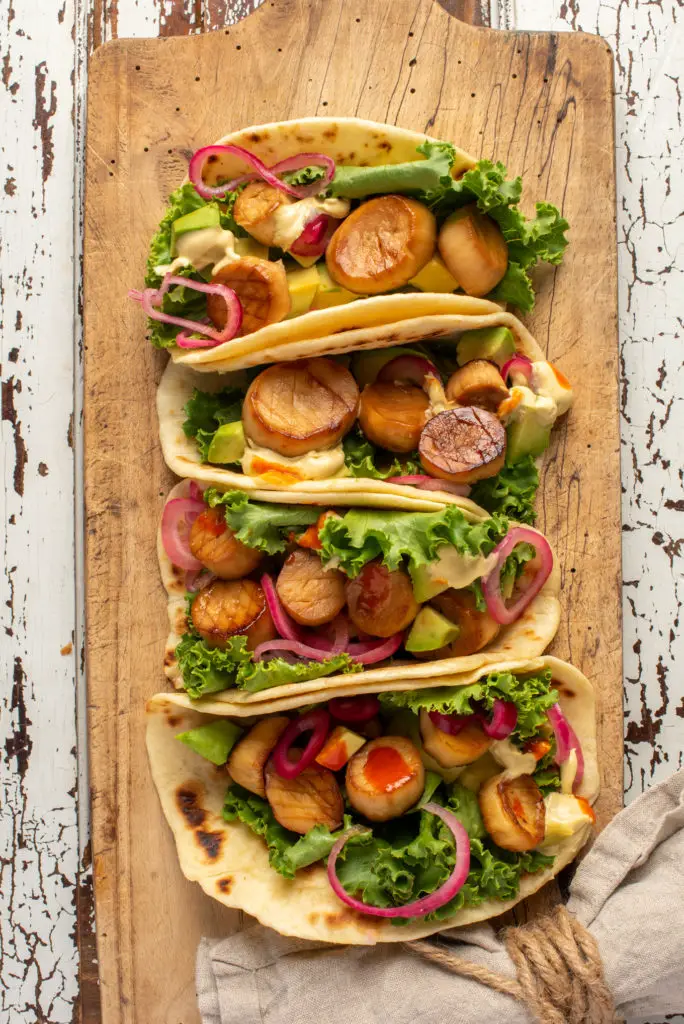 tacos on cutting board