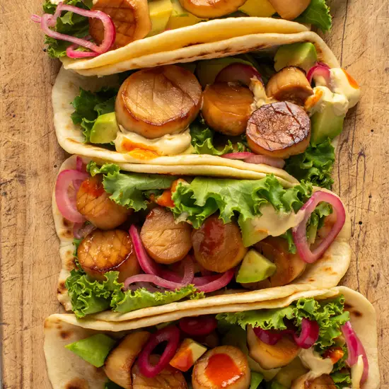 tacos on cutting board