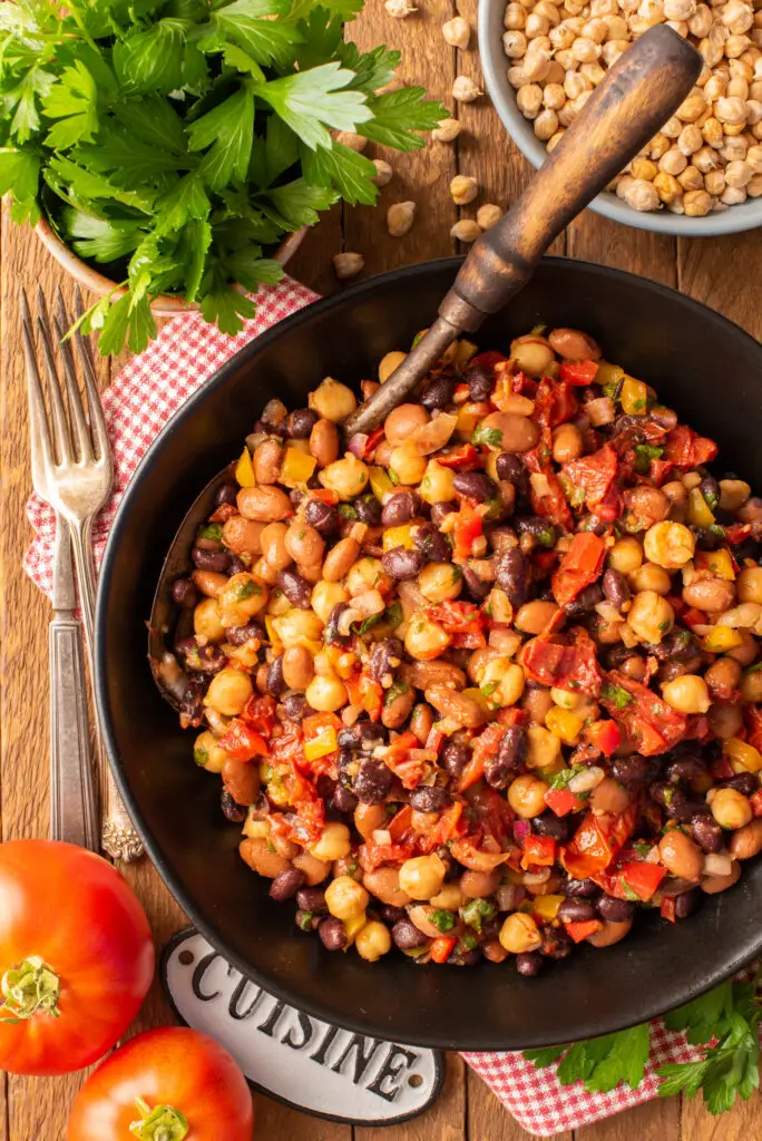 slow roasted tomato bean salad in bowl