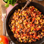 slow roasted tomato bean salad in bowl