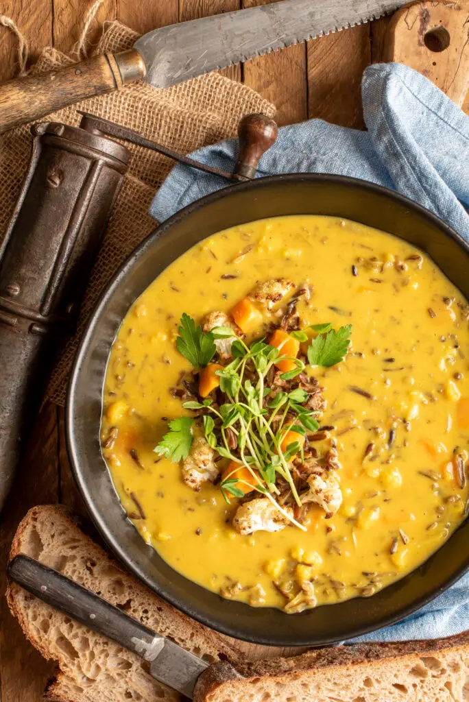 curried cauliflower and wild rice soup in bowl