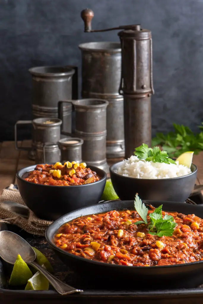 chili and rice in bowls