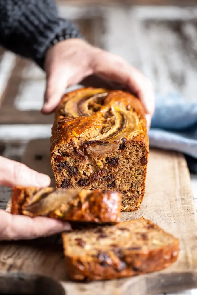 seedy chocolate chip banana bread on cutting board