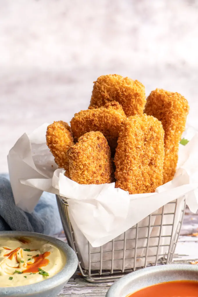 crispy tofu strips in wire basket