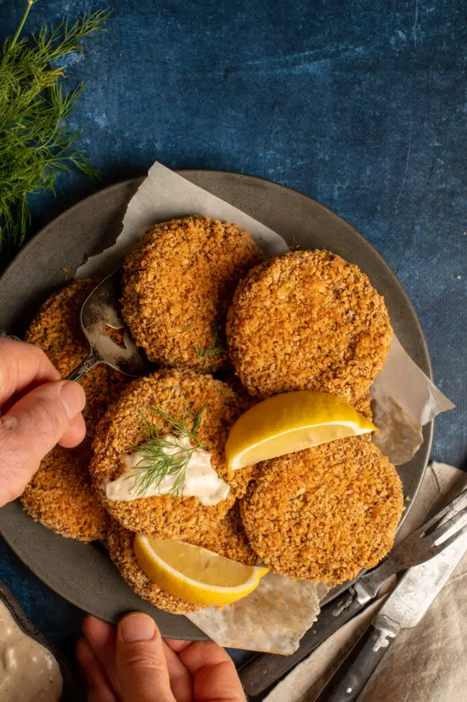 vegan crabless cakes on pewter plate