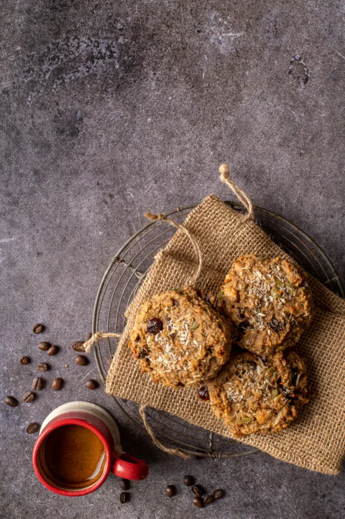 nut butter breakfast cookies on small burlap bags on cooling rack