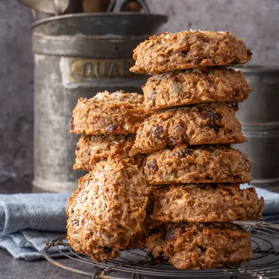 nut butter breakfast cookies stacked on cooling rack - recipe image