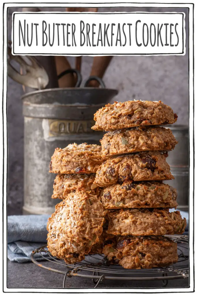 nut butter breakfast cookies stacked on cooling rack - pinterest image