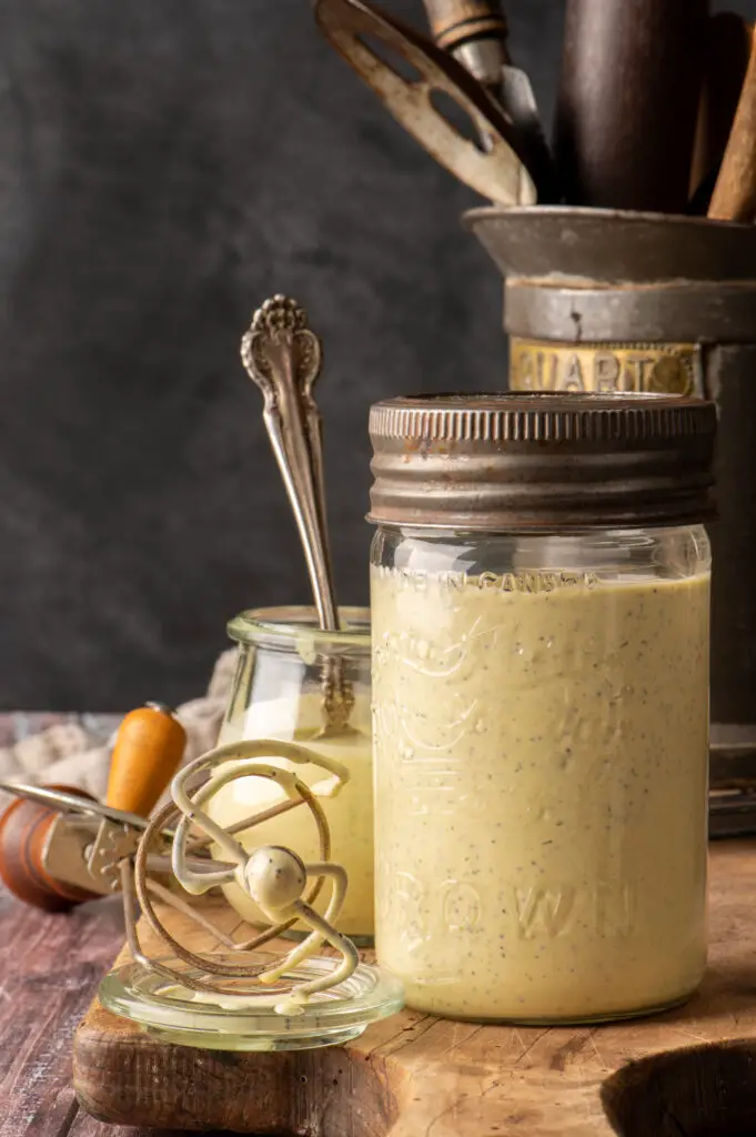 vegan lemon poppyseed dressing in glass jar