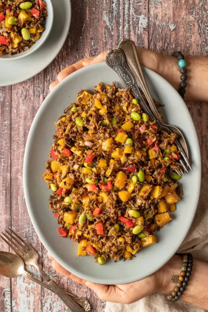 wild rice and mango salad on serving platter