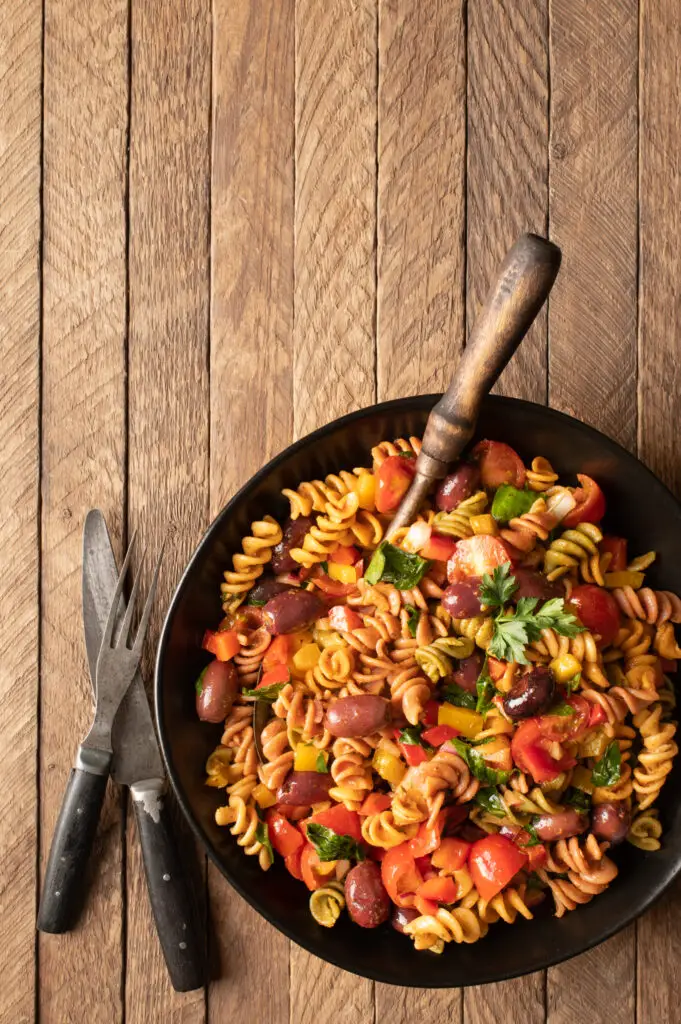 simple italian pasta salad in black bowl