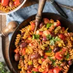 simple italian pasta salad in black bowl - recipe image