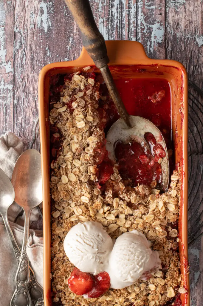strawberry coconut crumble in baking dish