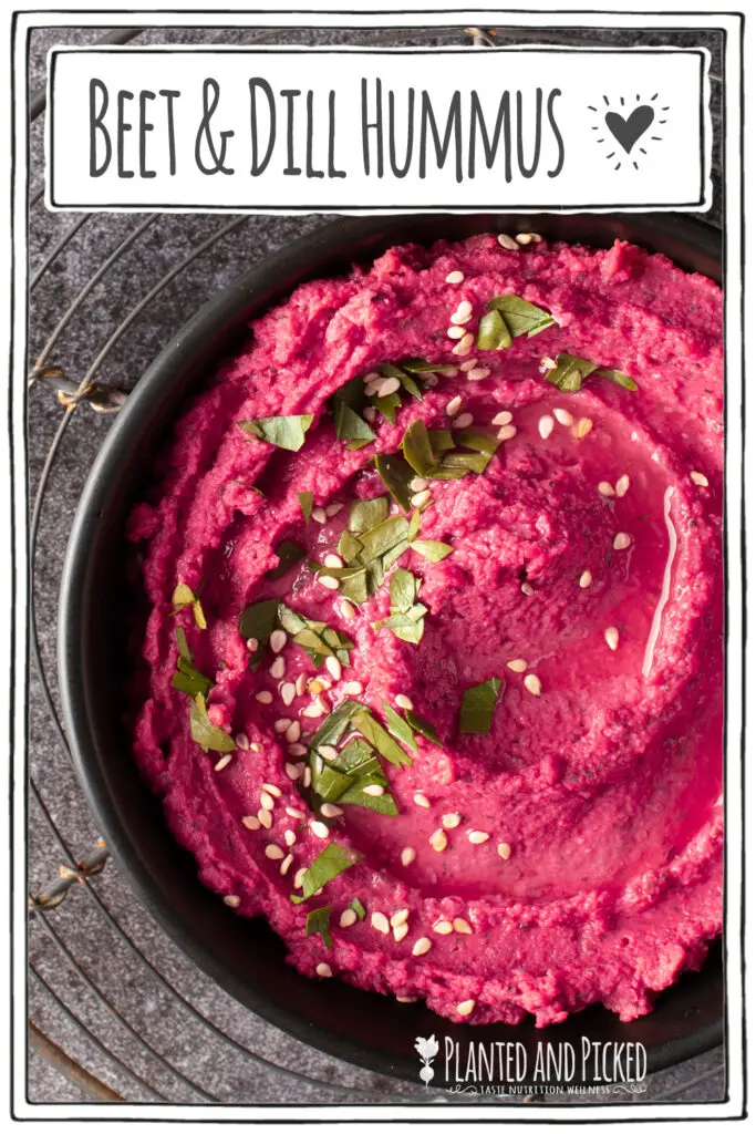 beet and dill hummus in black bowl on cooling rack - pinterest image