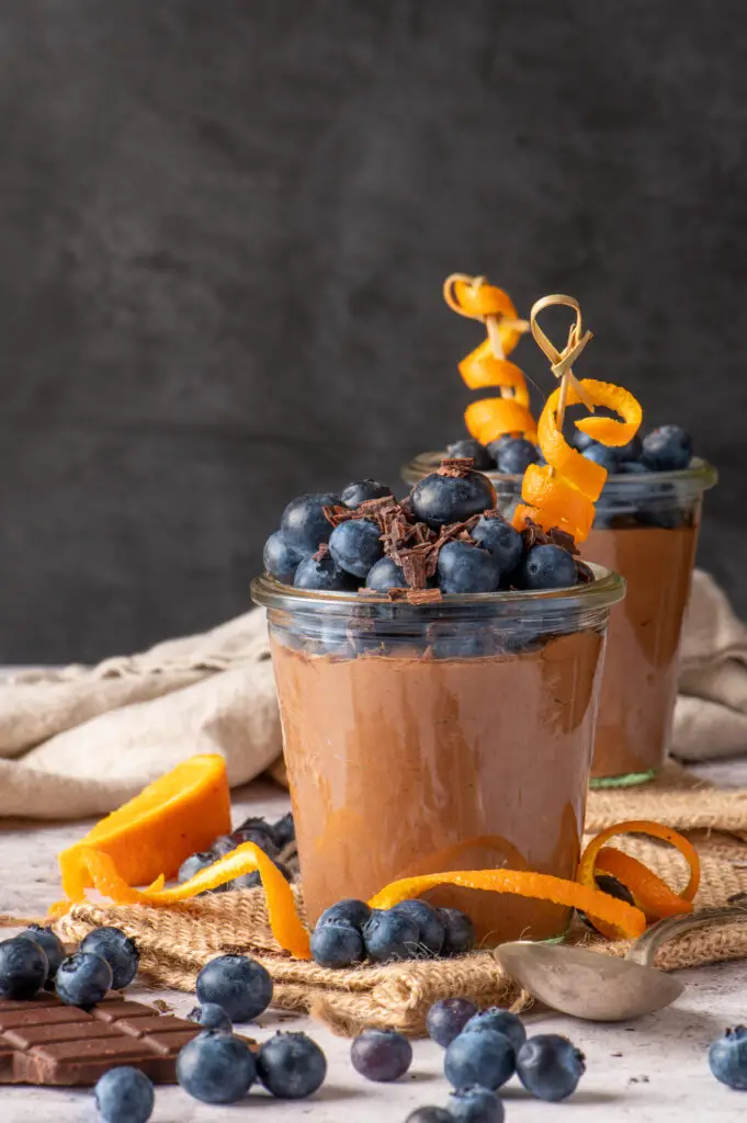 creamy chocolate coconut pudding in jars