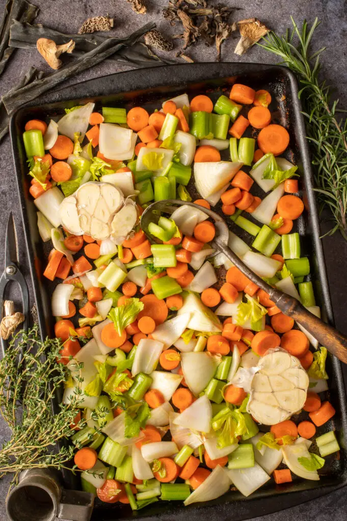 prepared vegetables on baking sheet