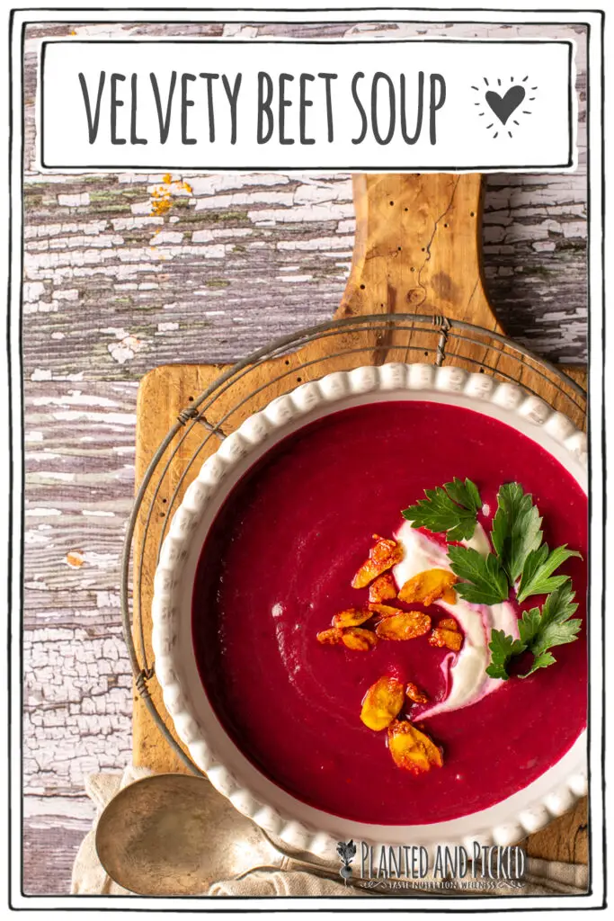 velvety beet soup in white bowl sitting on cutting board - pinterest image