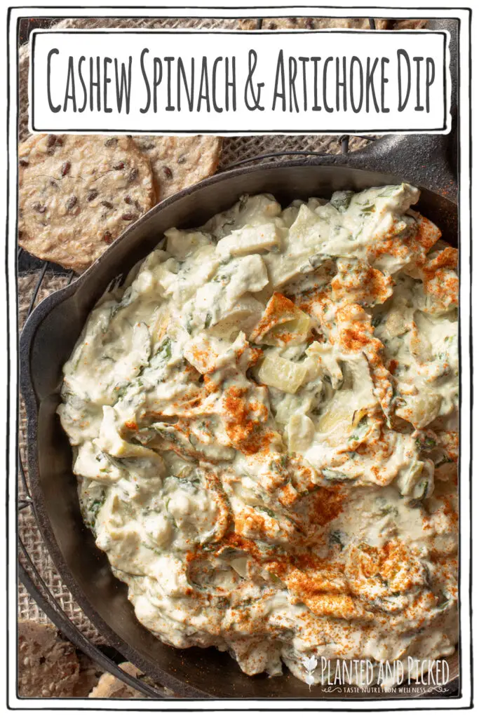 cashew spinach and artichoke dip in iron skillet - pinterest image